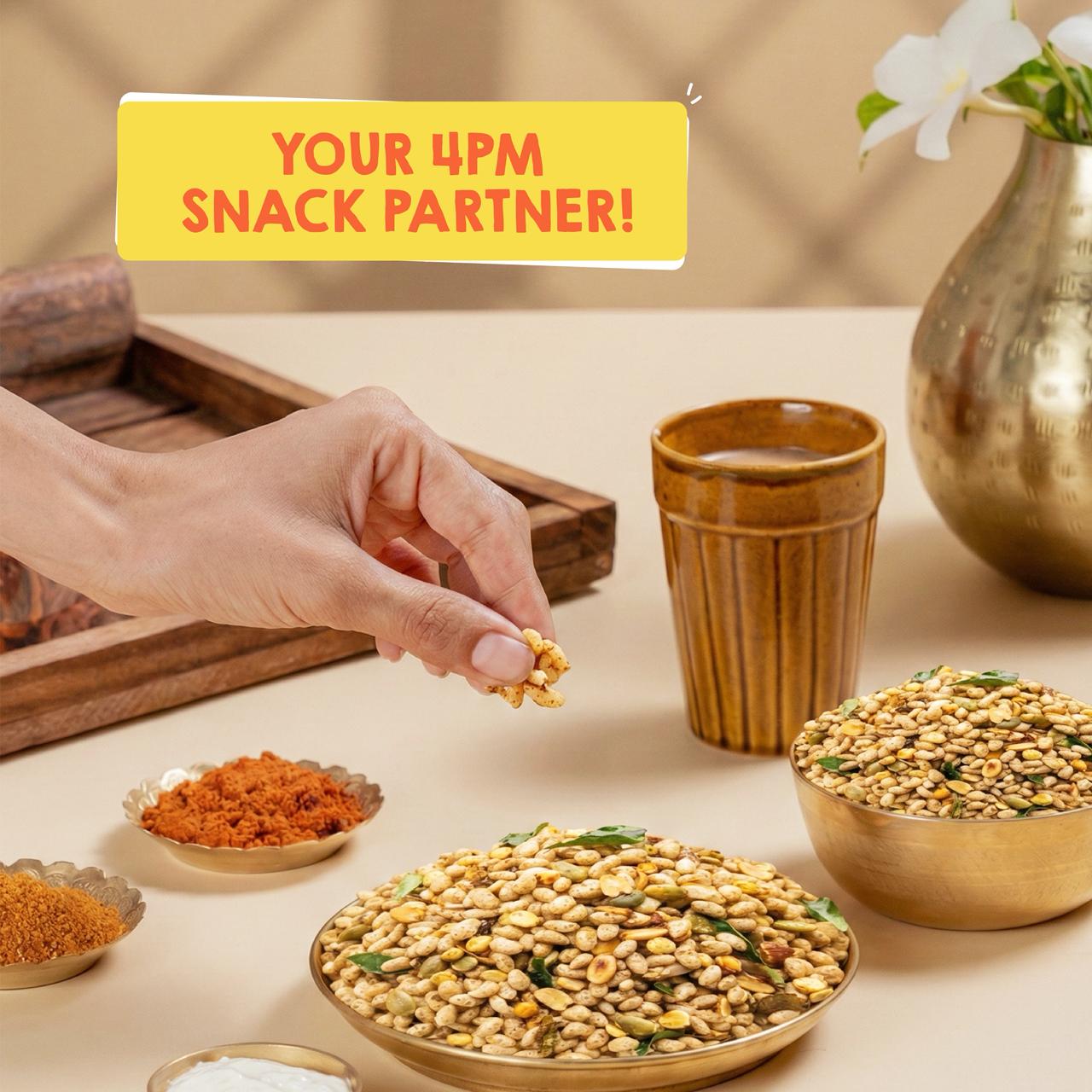 Bajra Namkeen | Roasted bajra puffs, nuts & seeds, finished with garlic, green chili and curry leaves.